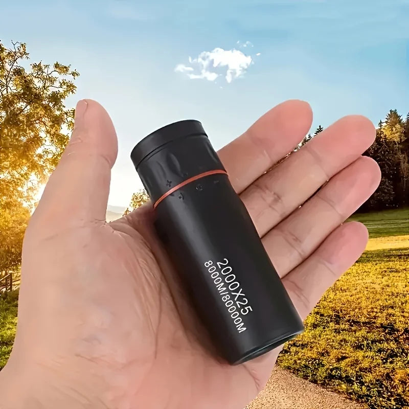 Compacte monoculaire verrekijker in de hand